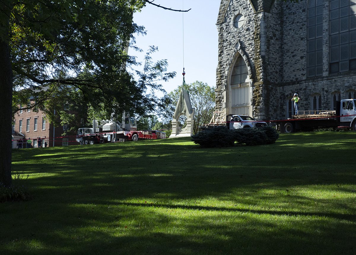 Crews are installing the first piece of metal fabrication to the clock tower on King Chapel! The work is part of a bigger project to fix up that entire tower and clock.